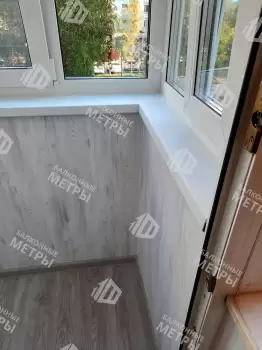 Отделка и остекление Г-образного балкона