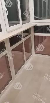 Панорамное остекление с тонировкой и отделка балкона